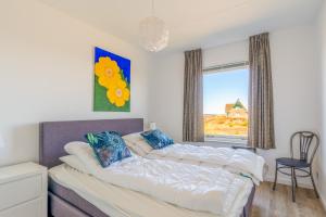 Ένα ή περισσότερα κρεβάτια σε δωμάτιο στο Appartementencomplex Juliana 170