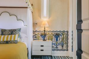 Cama ou camas em um quarto em Bela Vista Hotel & Spa - Relais & Chateaux