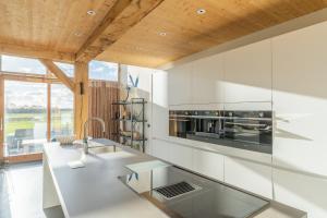 Cuisine ou kitchenette dans l'établissement Buytenplaats Villa 189