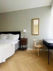 Postel nebo postele na pokoji v ubytování Ulrika's Suite