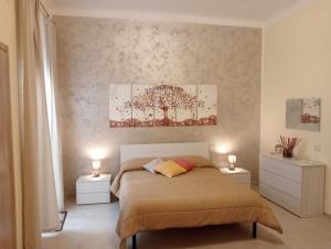 Postel nebo postele na pokoji v ubytování B&B CASA ELISABETTA