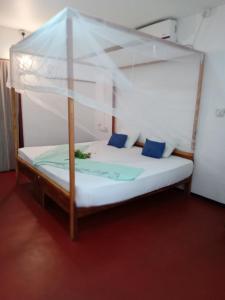 Postel nebo postele na pokoji v ubytování Beach Cab Resort