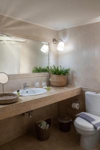 Koupelna v ubytování Amalthia Apartment Piraeus + 10 fotografií