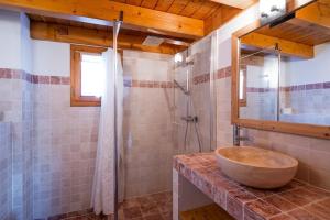 a bathroom with a wooden sink and a shower at Le Dahu - 8-kamer chalet + sauna & bar 14 personen in Landry