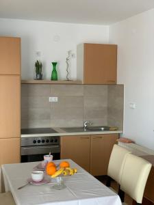 A kitchen or kitchenette at Lilium Villa Hévíz