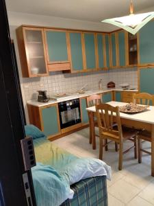 A kitchen or kitchenette at Casa Pavone