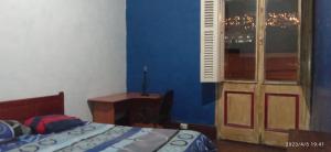 En eller flere senge i et værelse på Azul Profundo Hostal Cultural + 2 billeder