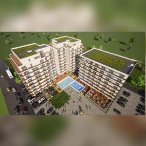 una vista aérea de una rendimiento de un edificio en Almar Luxury Residence - Renting Apartments & Free Pool, en Mamaia Nord – Năvodari