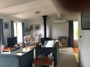 O zonă de relaxare la Beach Cottage in Ventnor