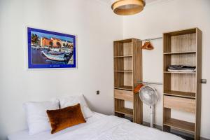 Кровать или кровати в номере Flavia - Central, Balcon, Clim - Ajaccio