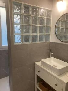 Ένα μπάνιο στο Appartement Le Coty