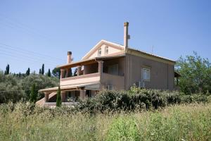 a house on the side of a hill at Estia's House in Ágios Prokópios