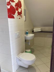 Kúpeľňa v ubytovaní Apartamenty i Pokoje Na Letniej