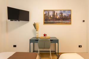 A television and/or entertainment centre at Italianflat - Vittoria Suite
