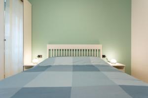 A bed or beds in a room at Italianflat - Vittoria Suite