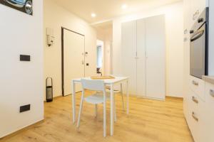 A kitchen or kitchenette at Italianflat - Vittoria Suite