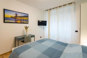 A bed or beds in a room at Italianflat - Vittoria Suite