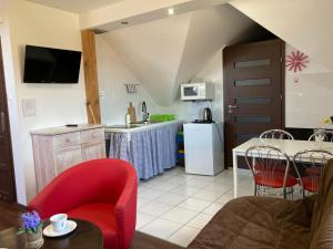 Kuchyňa alebo kuchynka v ubytovaní Apartamenty i Pokoje Na Letniej