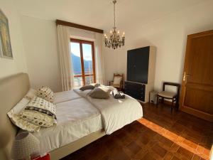 Postel nebo postele na pokoji v ubytování B&B Rox e Claudia