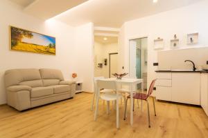 A kitchen or kitchenette at Italianflat - Vittoria Suite
