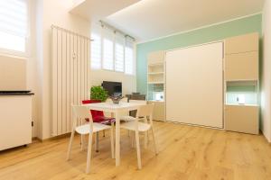 A kitchen or kitchenette at Italianflat - Vittoria Suite