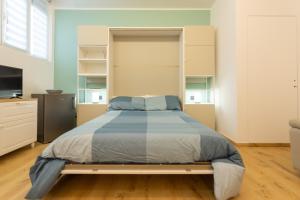 A bed or beds in a room at Italianflat - Vittoria Suite