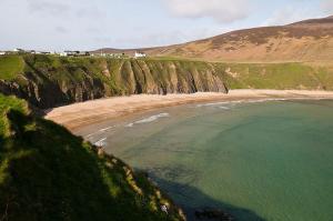 an aerial view of a beach and the ocean at Slieve League Lodge in Carrick +31 photos