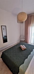 Letto o letti in una camera di Giotouli Apartment