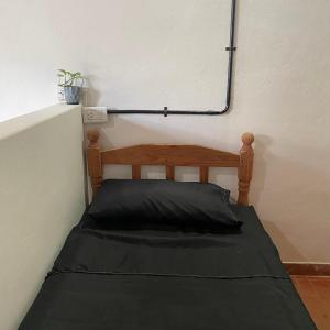 Ένα ή περισσότερα κρεβάτια σε δωμάτιο στο Monoambiente E en Corrientes Capital +6 φωτογραφίες