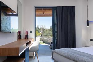 Postel nebo postele na pokoji v ubytování Agapi Luxury Villa + 37 fotografií