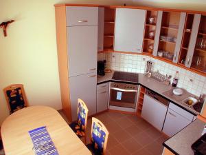 Kuchyň nebo kuchyňský kout v ubytování Ferienhaus Dorfruhe
