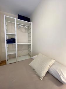 A bed or beds in a room at Atico duplex en Malgrat de Mar