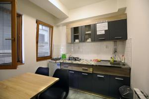 Kuchyň nebo kuchyňský kout v ubytování Hostel 42