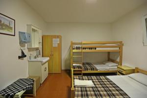 Postel nebo postele na pokoji v ubytování Hostel 42