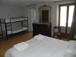 מיטה או מיטות בחדר ב-Hotel Nuovo Pecetto