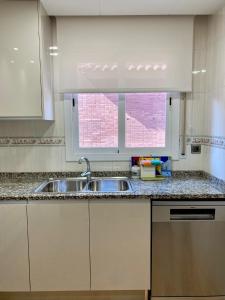 A kitchen or kitchenette at Atico duplex en Malgrat de Mar