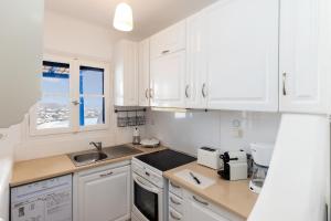 Kuchyň nebo kuchyňský kout v ubytování Mykonos Psarou Place