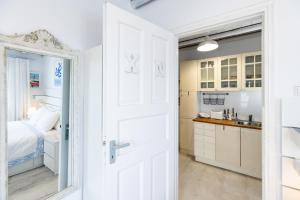 Kuchyň nebo kuchyňský kout v ubytování Mykonos Psarou Place