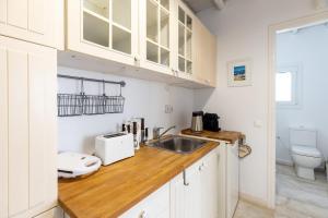 Kuchyň nebo kuchyňský kout v ubytování Mykonos Psarou Place