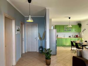 Kuchyň nebo kuchyňský kout v ubytování Coralli Pentati 1 "Dimitris Apartments"
