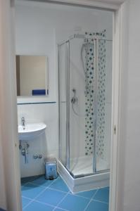 a bathroom with a shower and a sink at Il Giardinetto in Civitavecchia