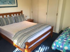 Ένα ή περισσότερα κρεβάτια σε δωμάτιο στο Red Rocks Road, Beach House in Cowes