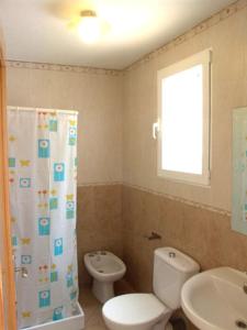 Ванна кімната в Apartment Palmar I 50 por ciento dscto direco