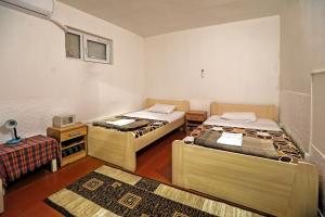 Postel nebo postele na pokoji v ubytování Hostel 42