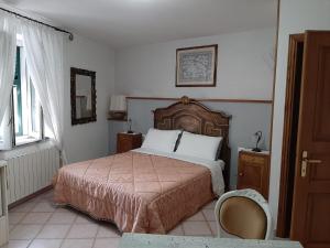 A bed or beds in a room at La Villa