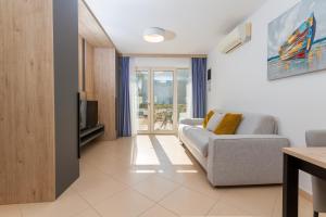 Μια τηλεόραση ή/και κέντρο ψυχαγωγίας στο Apartma Palma Umag