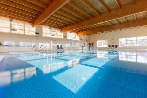 Bazén v ubytování BURSZTYN - BERNSTEIN SPA & Wellness nebo v jeho okolí + 37 fotografií