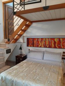 A bed or beds in a room at La Villa