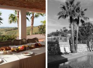 a table with food and a view of a palm tree at The Collector's House Finca with sea view in Mijas
