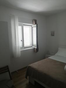Postel nebo postele na pokoji v ubytování Apartment